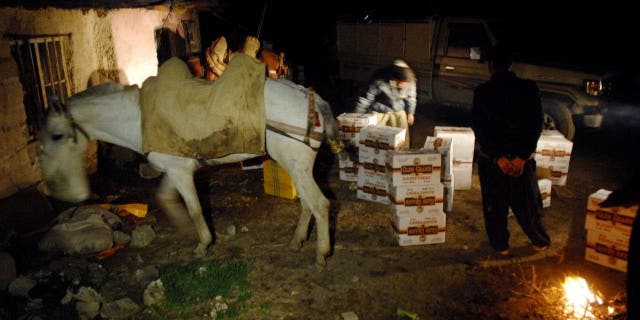 An alcohol smuggling operation at the border near Sulaimaniya, 160 miles northeast of Baghdad, on March 20, 2010.