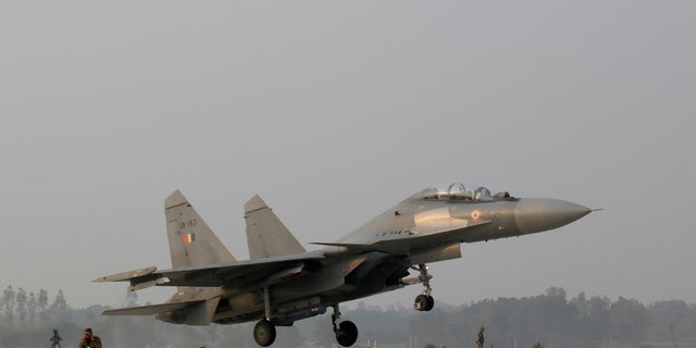 Indian Air Force Sukhoi Su-30MKI fighter jet takes off from newly constructed highway after Indian Prime Minister Narendra Modi inaugurated the 340km Purvanchal Expressway at Sultanpur in the northern state of Uttar Pradesh, India on 16 November 2021. 