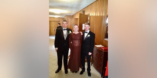 Andrew Wonacott's wife Brandi is pictured with their two sons James and William.