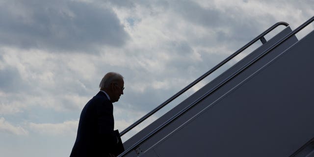 US President Joe Biden boards Air Force One for travel to Alabama from Delaware Air National Guard Base in New Castle, Delaware, US March 5, 2023.