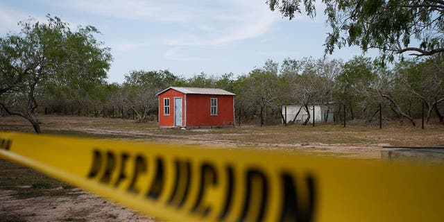 A general view of a storage shed behind a police cordon, at the scene where authorities found the bodies of two of four Americans kidnapped by gunmen, in Matamoros, Mexico March 7, 2023.