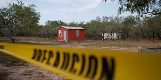 A general view of a storage shed behind a police cordon, at the scene where authorities found the bodies of two of four Americans kidnapped by gunmen, in Matamoros, Mexico March 7, 2023.