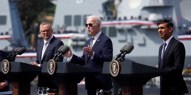 President Biden, center, Australian Prime Minister Anthony Albanese and British Prime Minister Rishi Sunak, left, deliver remarks on the Australia - United Kingdom - U.S. (AUKUS) partnership, after a trilateral meeting, at Naval Base Point Loma in San Diego March 13, 2023. 