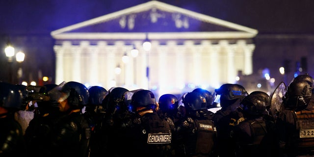 Members of the gendarmerie stand guard during a demonstration on Place de la Concorde in Paris, France, March 17, 2023. 