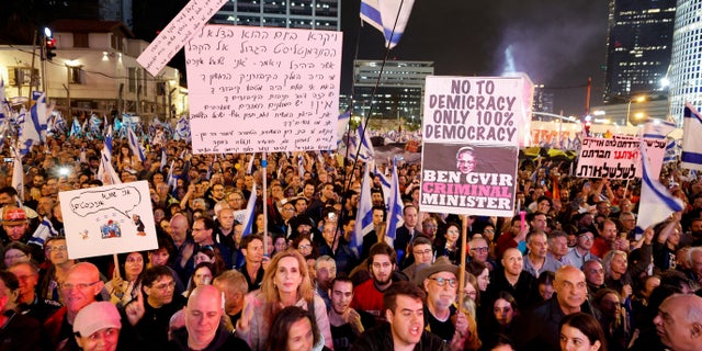 People attend a demonstration against Israeli Prime Minister Benjamin Netanyahu's judicial overhaul, in Tel Aviv, Israel March 25, 2023.