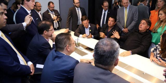Brazil's former President Jair Bolsonaro attends a meeting with members of his party and allies after he returned to Brasilia, Brazil, from self-imposed exile in Florida on March 30, 2023.