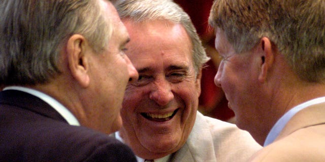 North Carolina state Sen. Tony Rand, left, state Sen. David Hoyle, center, and state Sen. Marc Basnight share a laugh on June 30, 2005, in Raleigh. Hoyle died on March 29, 2023, at age 84.