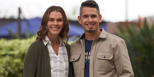 Stacie Wood and her husband, Andy Wood, stand for a portrait on Oct. 16, 2022, at Saddleback Church in Lake Forest, California.