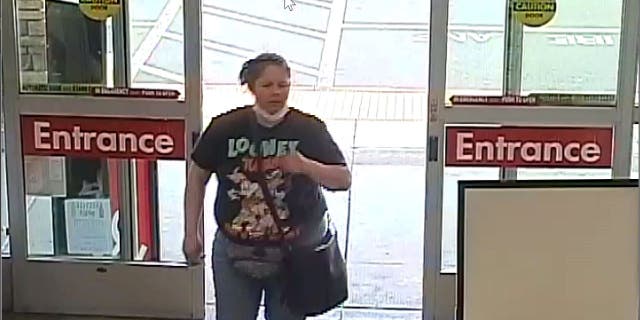 The suspect wore a black fanny pack and a "Looney Tunes" t-shirt when the armed robbery took place.