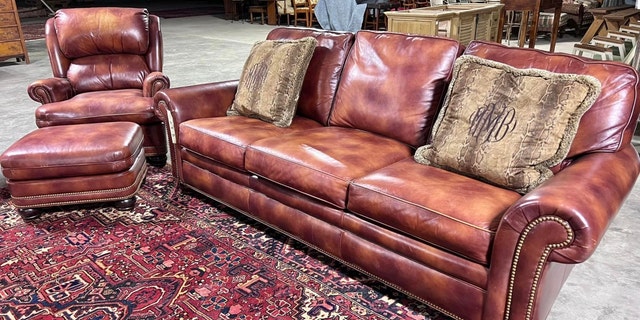 A leather couch from Moselle, the Murdaugh family's South Carolina hunting estate, sold Thursday for $14,000 at Liberty Auction.