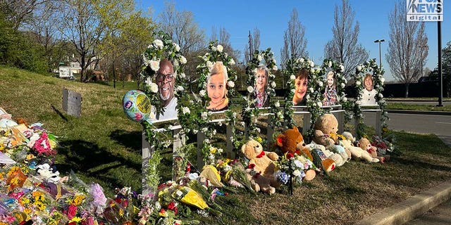 Memorials for the six victims who were killed in a mass shooting are placed outside The Covenant School in Nashville, Tennessee on Thursday, March 30, 2023. On Monday, three adults and three children were killed inside the school.