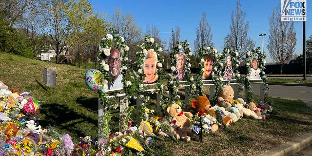 Memorials for the six victims who were killed in a mass shooting are placed outside The Covenant School in Nashville, Tennessee on Thursday, March 30, 2023. On Monday, three adults and three children were killed inside the school.
