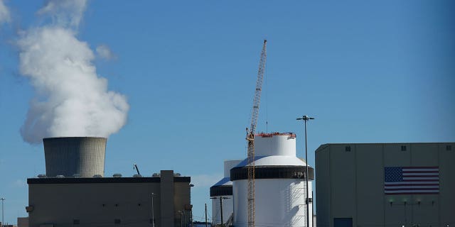 Reactor number 3 and its cooling tower stands at Georgia Power Co.'s Plant Vogtle nuclear power plant on Jan. 20, 2023, in Georgia. The nuclear plant has begun splitting atoms in one of its two new reactors.