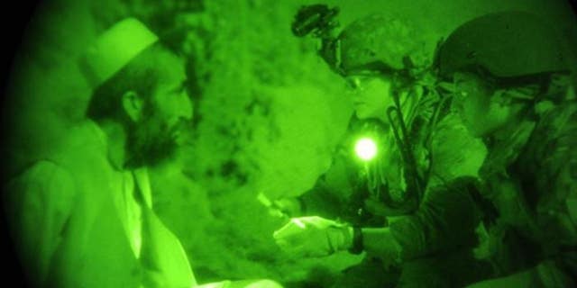Jax Scott is in the middle. Taken while deployed in northern Afghanistan in 2012, by a combat camera.