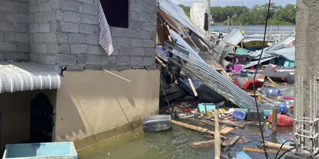 Household items float in the water after an earthquake rocked Machala, Ecuador on Saturday, March 18, 2023. 