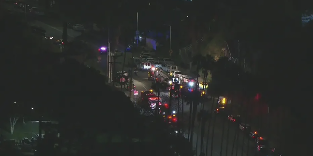 A heavy police presence is in Lincoln Heights, a neighbor where at least three police officers have been shot and a suspect is at-large.