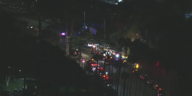 A heavy police presence is in Lincoln Heights, a neighbor where at least three police officers have been shot and a suspect is at-large.