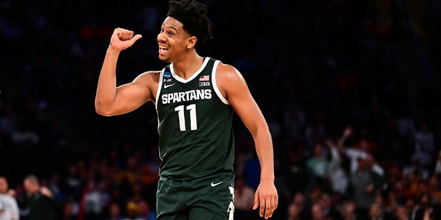 AJ Hoggard #11 of the Michigan State Spartans reacts during the first half of the game against the Kansas State Wildcats during the Sweet Sixteen round of the 2023 NCAA Men's Basketball Tournament held at Madison Square Garden on March 23, 2023 in the city from New York.