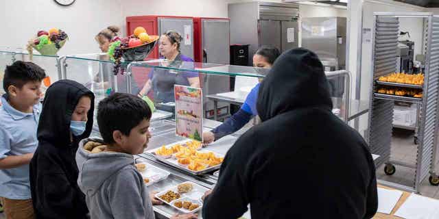 Students select their meal during lunch break in Phoenix, Arizona, on Jan. 31, 2023. 