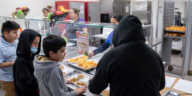 Students select their meal during lunch break in Phoenix, Arizona, on Jan. 31, 2023.