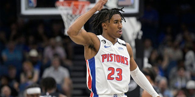 Detroit Pistons guard Jaden Ivey, #23, reacts after scoring a 3-pointer during the first half of an NBA basketball game against the Orlando Magic, Thursday, Feb. 23, 2023, in Orlando, Florida.