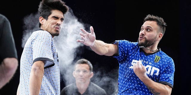 In this photo provided by Zuffa LLC, Azael Rodriguez slaps Jesus Gaspar at a Power Slap event in Rio De Janiero, Brazil, Nov. 30, 2022.