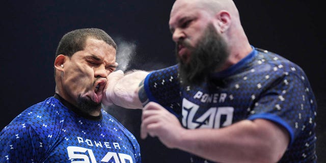 In this photo provided by Zuffa LLC, Ryan Phillips slaps Rob Perez at a Power Slap event in Las Vegas March 31, 2022.