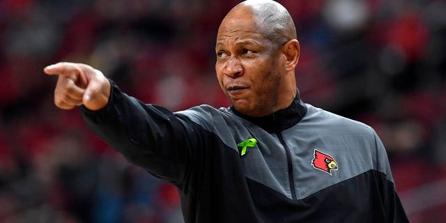 Louisville head coach Kenny Payne leads his team during the second half of an NCAA college basketball game against Virginia Tech in Louisville, Ky., on Tuesday, February 28, 2023. Virginia Tech won 71-54 . 