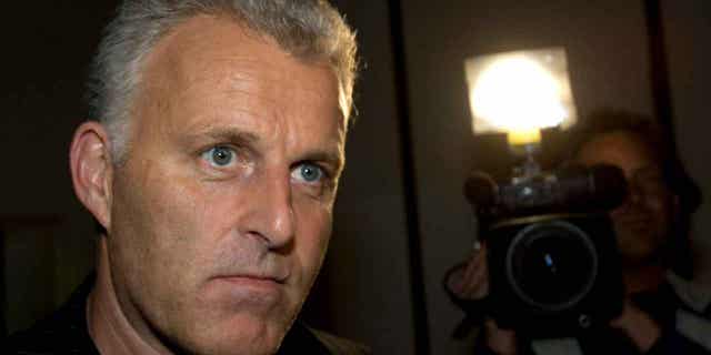 Dutch crime reporter Peter R. de Vries is pictured prior to attending a live TV show in Amsterdam, Netherlands, on Jan. 31, 2008. A report into three murders said on March 1, 2023, that security service in the Netherlands did not always act on tips about possible threats to the victims.