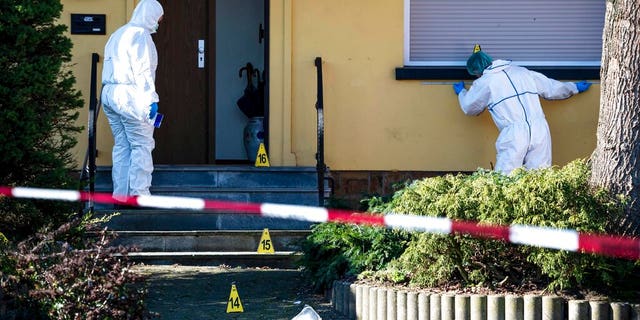 Emergency services secure the evidence after the shooting of a 16-year-old, who was critically injured in Bramsche, Germany, on Feb. 28, 2023. German authorities said Thursday, March 2, 2023 that a 16-year-old boy has died after being shot in the head by an 81-year-old neighbor. 