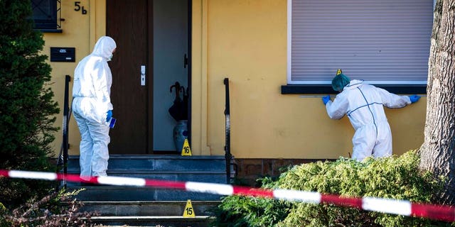 Emergency services secure the evidence after the shooting of a 16-year-old, who was critically injured in Bramsche, Germany, on Feb. 28, 2023. German authorities said Thursday, March 2, 2023 that a 16-year-old boy has died after being shot in the head by an 81-year-old neighbor.