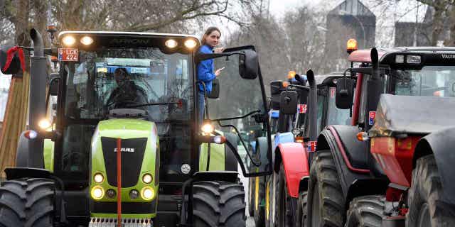 Tractors driven by angry farmers block traffic on a road in the center of Brussels, during a demonstration on March 3, 2023. 