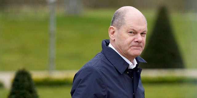 German Chancellor Olaf Scholz arrives for a two-day closed meeting of the German government at Meseberg palace in Gransee near Berlin, Germany, Sunday, March 5, 2023. 