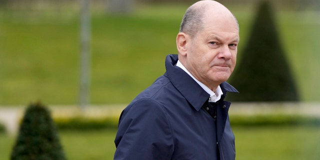 German Chancellor Olaf Scholz arrives for a two-day closed meeting of the German government at Meseberg palace in Gransee near Berlin, Germany, Sunday, March 5, 2023. 