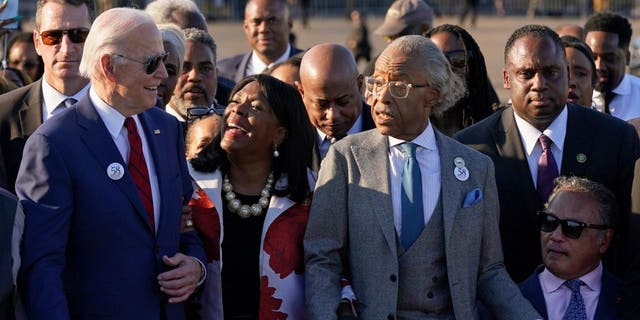 From left, Biden, Rep. Terri Sewell, D-Ala., the Rev. Al Sharpton, and the Rev. Jesse Jackson.