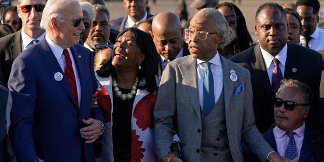 From left, Biden, Rep. Terri Sewell, D-Ala., the Rev. Al Sharpton, and the Rev. Jesse Jackson.