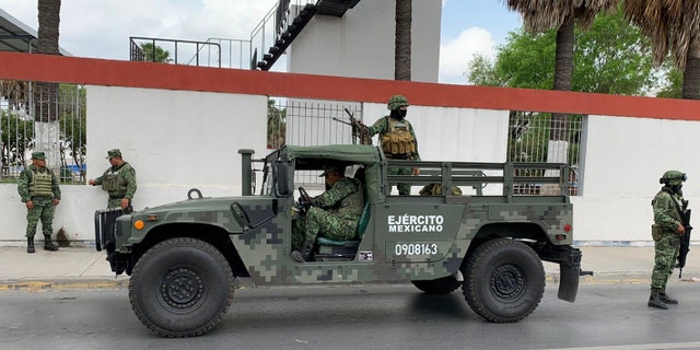 Mexican army soldiers prepare a search mission for four U.S. citizens kidnapped by gunmen in Matamoros, Mexico, Monday, March 6, 2023.