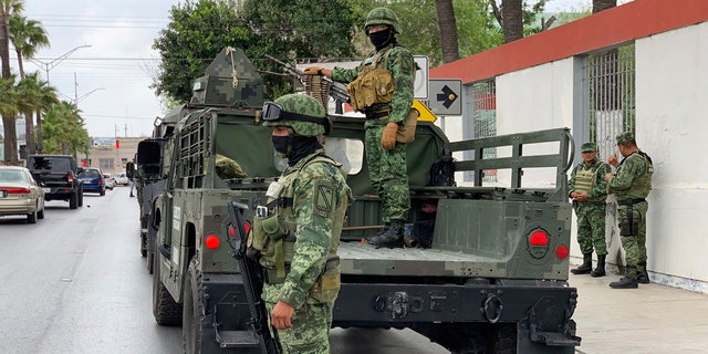 Mexican Army soldiers prepare for a search mission for four US citizens who were kidnapped by gunmen in Matamoros, Mexico, on Monday, March 6, 2023. 