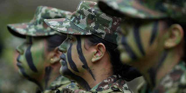Female voluntary recruits attend a three-month training program in Bogotá, Colombia, on March 6, 2023. The country's army is once again allowing women to join its ranks through voluntary military service.