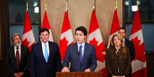 Canada's Prime Minister Justin Trudeau, center, speaks during a news conference on Parliament Hill in Ottawa, Ontario, on Monday, March 6, 2023.