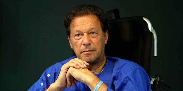 Former Pakistani Prime Minister Imran Khan speaks during a news conference in Shaukat Khanum hospital in Lahore, Pakistan, on Nov. 4, 2022. Two dozen Khan supporters were arrested for defying a government ban on holding rallies.