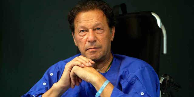 Former Pakistani Prime Minister Imran Khan speaks during a news conference in Shaukat Khanum hospital in Lahore, Pakistan, on Nov. 4, 2022. Two dozen Khan supporters were arrested for defying a government ban on holding rallies.