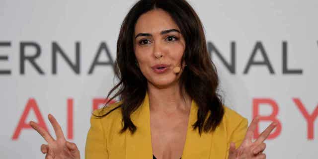 Actor Nazanin Boniadi talks during International Women's Day in Abu Dhabi, United Arab Emirates, on March 8, 2023. Boniadi is urging the world to back the protests in Iran calling for women's rights and political change.