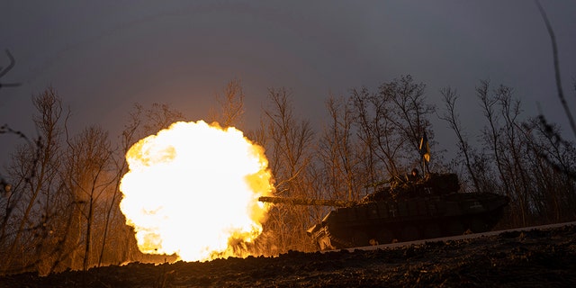 A Ukrainian tank fires on Russian positions at the front line near Bakhmut, Ukraine, March 8, 2023.