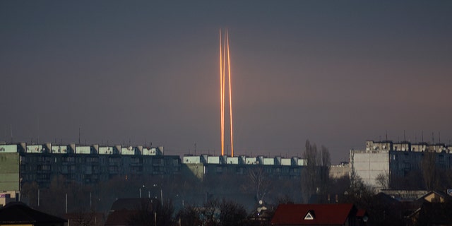 Three Russian rockets fired at Ukraine from Russia's Belgorod region are seen at dawn in Kharkiv, Ukraine on Thursday, March 9, 2023. 