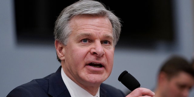 FBI Director Christopher Wray testifies during the House Select Committee on Intelligence annual open hearing on worldwide threats on Thursday. 