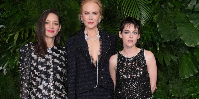 Marion Cotillard, Nicole Kidman, and Kristen Stewart posed for a photo together at the Chanel and Charles Finch dinner.