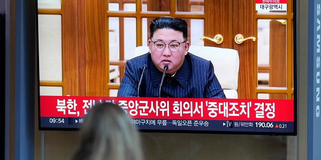 FILE - A TV screen shows an image of North Korean leader Kim Jong-un during a news program at the Seoul Train Station in Seoul, South Korea, March 13, 2023. 