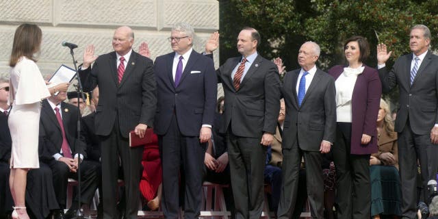 FILE - South Carolina Lt. Gov. Pamela Evette, left, administers the oath of office to state officers, from left, Secretary of State Mark Hammond, Treasurer Curtis Loftis, Attorney General Alan Wilson, Comptroller General Richard Eckstrom, Education Superintendent Ellen Weaver and Agriculture Secretary Hugh Weathers, at inaugural ceremonies, Jan. 11, 2023, in Columbia, S.C. Pressure is mounting for Eckstrom after a $3.5B accounting error.