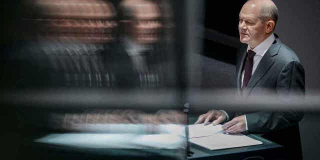 German Chancellor Olaf Scholz speaks at the Bundestag session in Berlin, Germany, on March 16, 2023. Scholz claimed his country needed to do a better job at curbing "irregular migration."